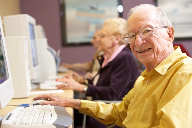 Senior man using computer